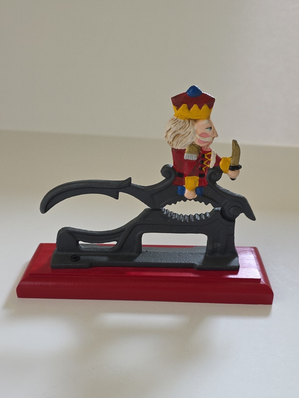 Decorative Nutcracker Lever-Style Nutcracker in Red, Black and Yellow